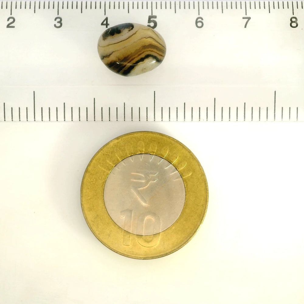 Indian Agate 6.78 Carat / 7.54 Ratti, Unheated and Untreated – No indications of treatment observed – shown against scale for size