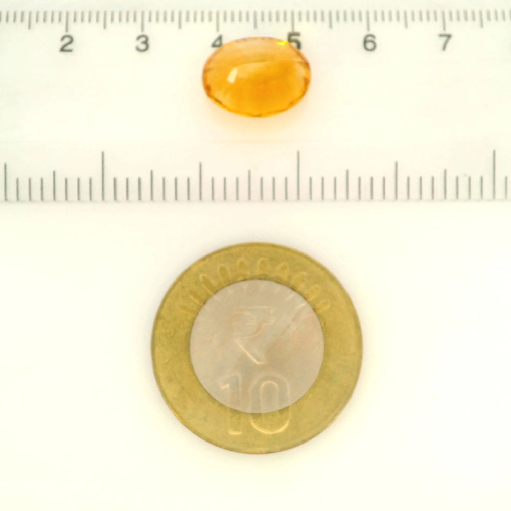 Brazilian Citrine 7.19 Carat / 7.99 Ratti, Unheated and Untreated – No indications of treatment observed – shown against scale for size