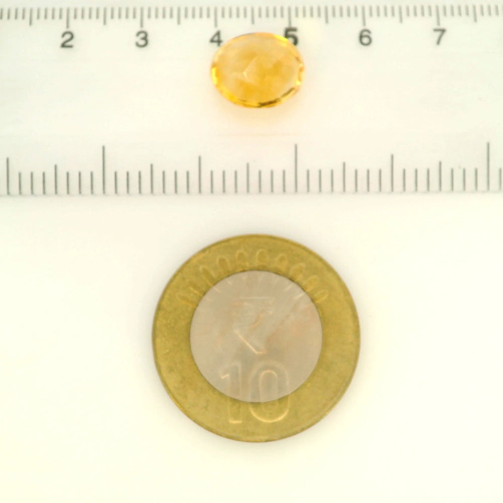 Brazilian Citrine 5.5 Carat / 6.12 Ratti, Unheated and Untreated – No indications of treatment observed – shown against scale for size
