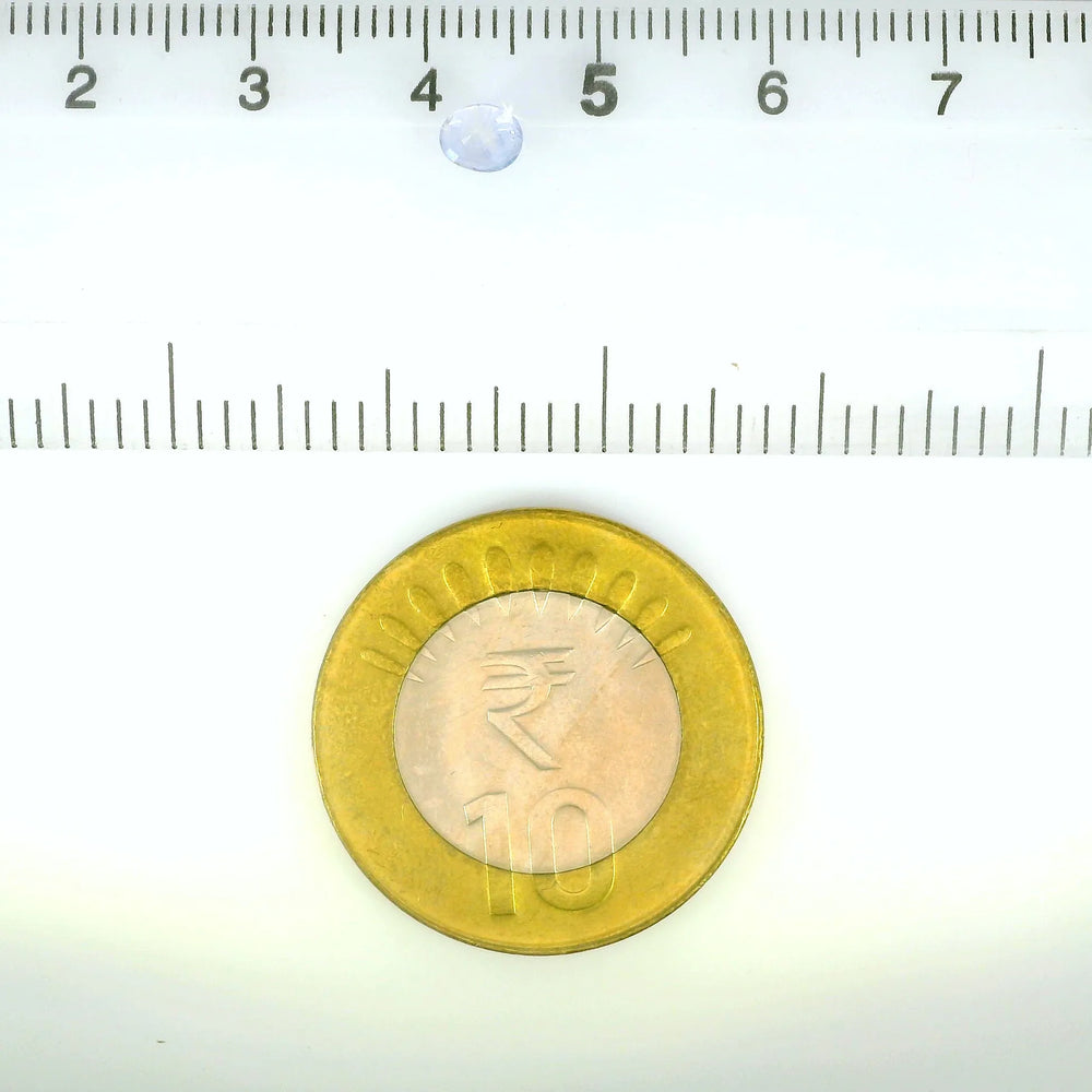 Kashmir Blue Sapphire (Neelam) 0.54 Carat / 0.6 Ratti, Unheated and Untreated – No indications of treatment observed – shown against scale for size