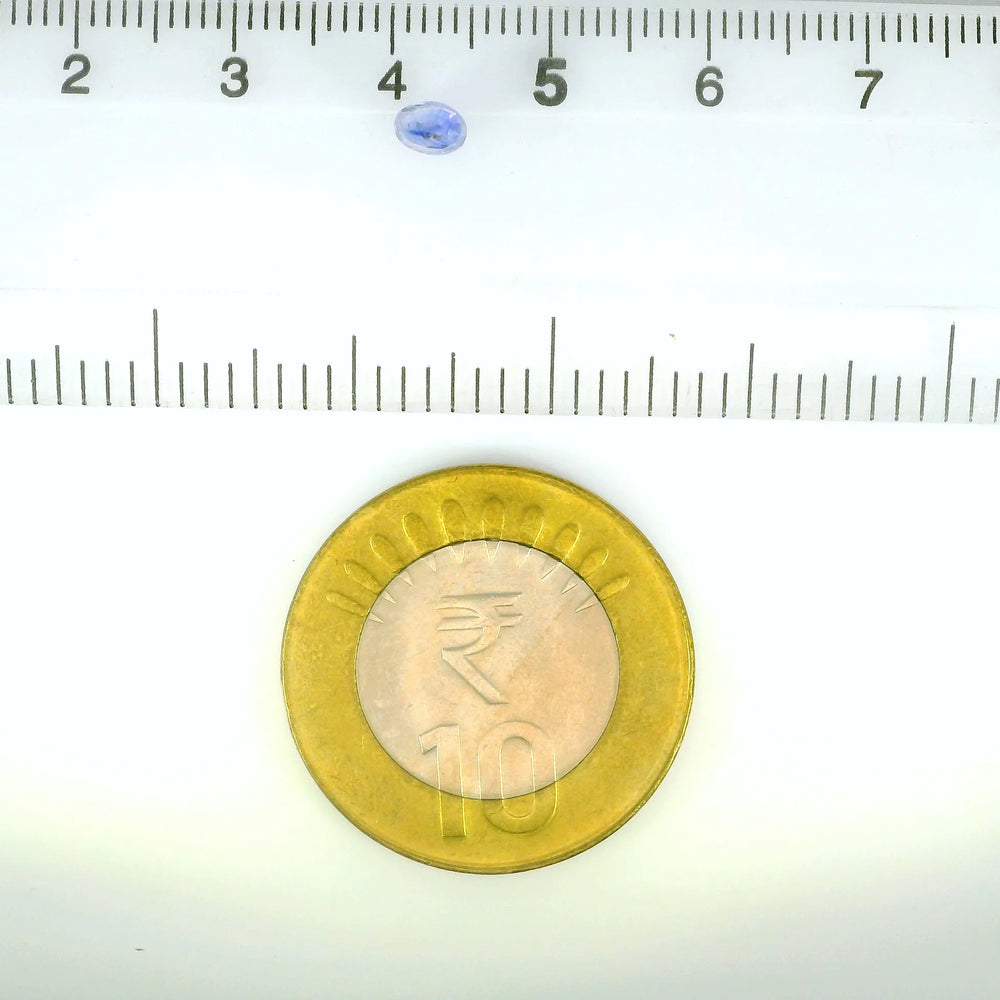 Kashmir Blue Sapphire (Neelam) 0.65 Carat / 0.73 Ratti, Unheated and Untreated – No indications of treatment observed – shown against scale for size