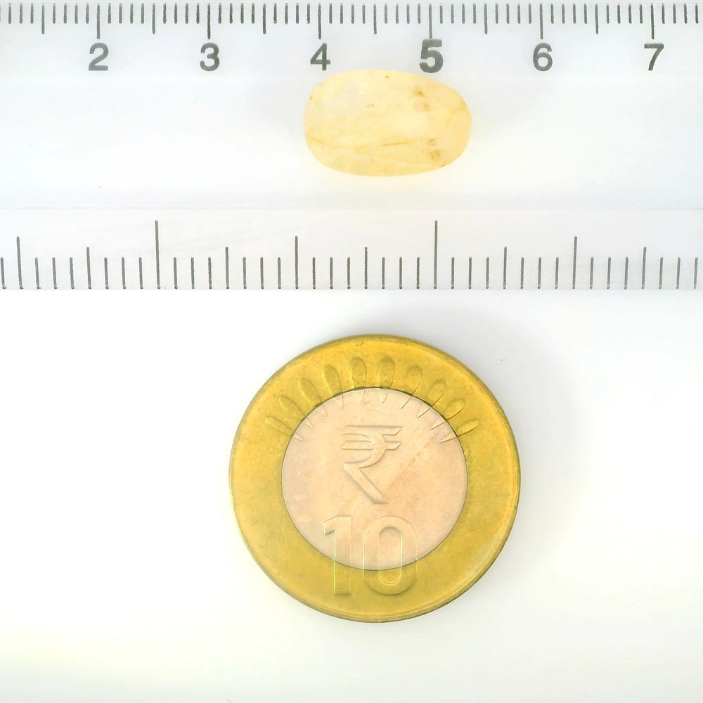 Yellow Sapphire (Pukhraj) 6.2 Carat / 6.89 Ratti, Unheated and Untreated – No indications of treatment observed – shown against scale for size