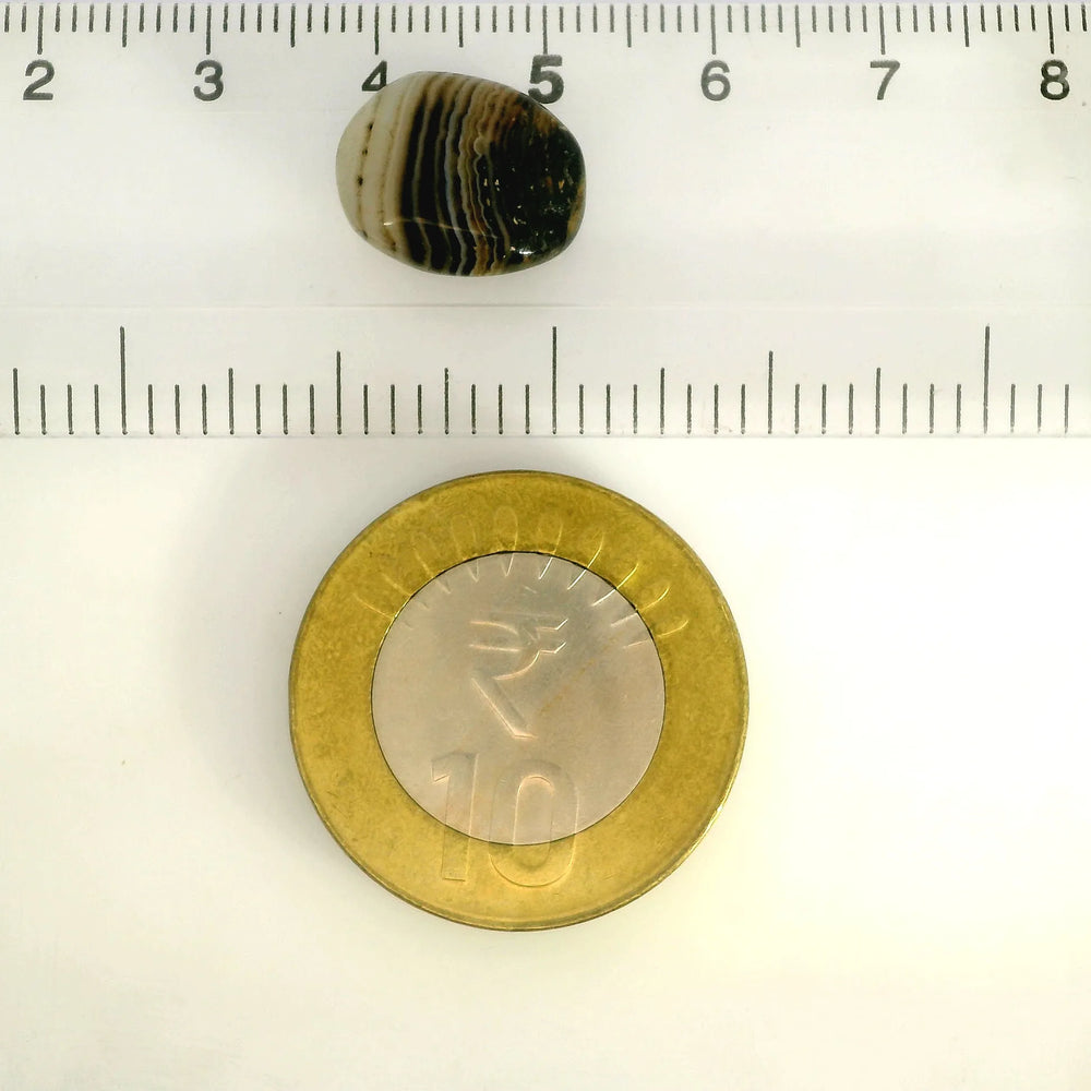 Indian Agate 7.16 Carat / 7.96 Ratti, Unheated and Untreated – No indications of treatment observed – shown against scale for size
