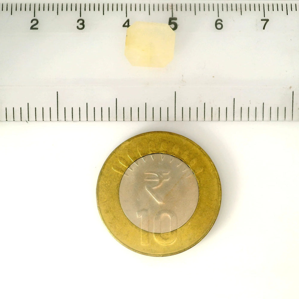 Yellow Sapphire (Pukhraj) 4.66 Carat / 5.18 Ratti, Unheated and Untreated – No indications of treatment observed – shown against scale for size